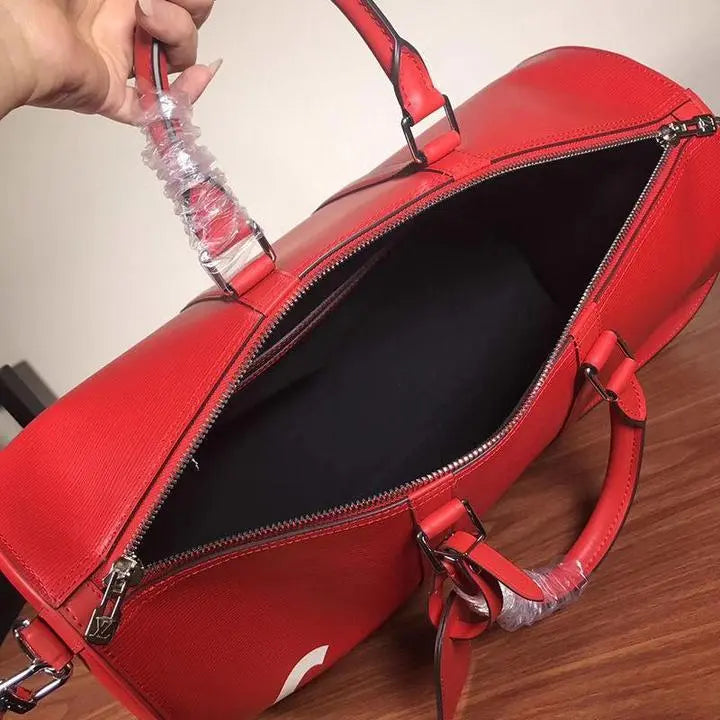 LOUIS VUITTON X SUPREME - TRAVEL BAG - https://treadfitpro.com/